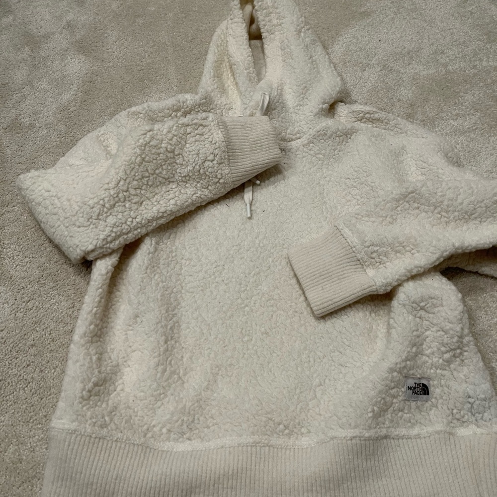 New in bag, never worn. Pet/smoke free home. Ivory colored LS hoodie.
